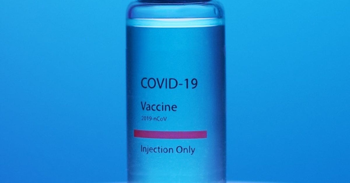 When is it valid to dismiss an unvaccinated employee who can work from